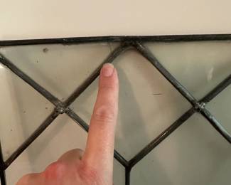 U46 - $50. Decorative Glass Panel. Measures 24" wide x 24" tall. One minor crack in the glass. Needs more support to use.