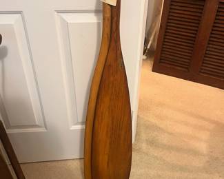 C24 - $125. PAIR of Canoe Paddles. One is marked "Old Town Canoe". Measures 71.5" tall.