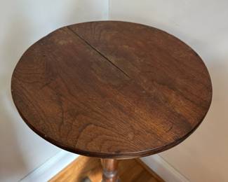 L12 - $25. Wooden Plant Stand. Sturdy but top does have a crack. Measures 16" wide x 32.5" tall