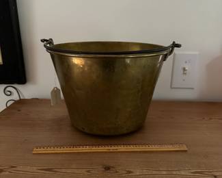 F31- $40. Antique American Brass Kettle No. 5. Measures 12.75" wide x 10.75" deep x 8" tall