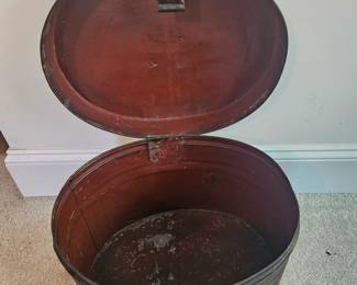 U12 - $50. Antique Victorian Metal Hat Box. Measures 15" wide x 12" deep x 11" tall.