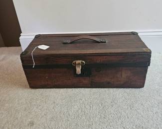U13 - $75. Antique Wooden Box with Leather Handle. Measures 20" wide x 8.75" deep x 7" tall.