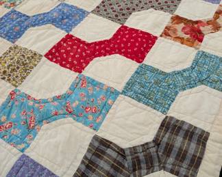 S1 - $50. Vintage Quilt. Measures 58" x 70". Pieced & Hand Quilted.