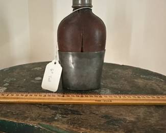 F3 - $30. James Dixon & Sons Leather Wrapped Glass Flask W/Base Cup. Measures 6" tall.