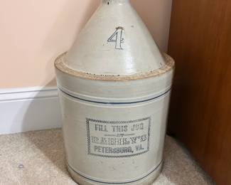 B12 - $125. 4 Gallon Rahily's Whiskey Jug. Petersburg, VA. Measures 10.75" wide x 18" tall.