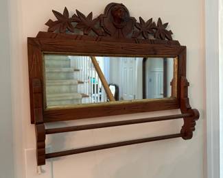 H1 - $50. Hand Carved Victorian Shaving Mirror with Towel Bar. Measures 20.5" wide x 16.5" tall.
