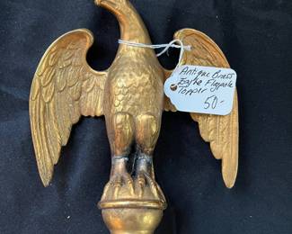 S25 - $50. Antique Brass Eagle Flagpole Topper. Measures 6" wide x 8" tall.
