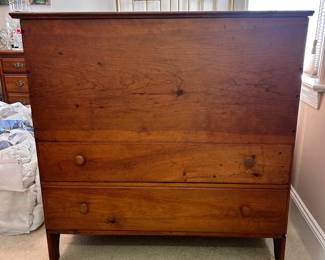 C9 - $350. Antique Mule Chest. Measures 39.5" wide x 17.5" deep x 40" tall. Lift top with open blanket chest. 2 drawers that both slide. (Tag from owner says 1800s Heart Pine.)