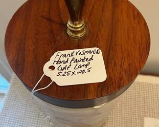 F53- $575. Frank Vosmanski Hand Painted Golfer Lamp. Base is 5.25 d x 20.5" tall.
