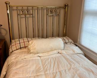 C18 - $100. Brass Bed Frame. Measures 49.5" wide x 81" long x Headboard 58" tall x Footboard 37" tall.