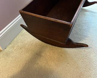 A14 - $30 Antique Wooden Rocking Cradle. Measures 38" wide x 24" deep x 24" tall. Very sturdy - great for baby dolls!