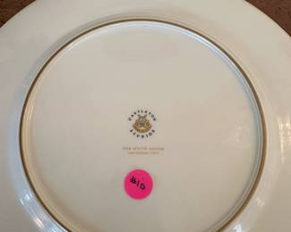 D60 - $1800. Dwight D. Eisenhower White House Plate 1955. Presidential Seal in the center with raised coin gold medallions. Back Stamp reads "Castleton Studios The White House November 1955. Measures 11.5" across. Only 120 produced!