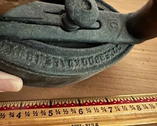 F28- $10. Wooden Handled Cast Iron, Vintage Iron. Measures 6.5" wide x 5.25" tall