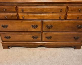 B6 - $100. Wooden Dresser and Mirror. Measures 56" wide x 18.25" deep x 33" tall. Mirror measures 41.25" wide x 31.25" tall. Drawers slide - lots of life left (but not perfect condition!)