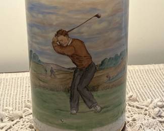 F53- $575. Frank Vosmanski Hand Painted Golfer Lamp. Base is 5.25 d x 20.5" tall.