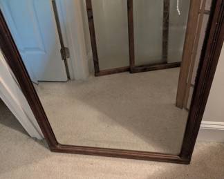 H14 - $40. Antique Wall Mirror. Measures 26.75" wide x 32.75" tall