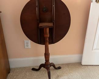 B2 - $75. Tilt Top Vintage/ Antique Wooden Table. Measures 22" round x 28.5" tall. Sturdy and in very good condition!