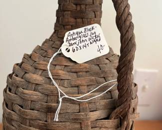 F54- $40. Antique Wicker Wrapped Glass Jug. 6dx14t