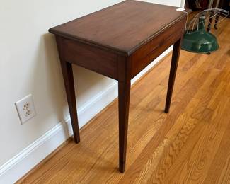 L49 - $175. Small Antique Side Table with Drawer. Measures 24" wide x 15" deep x 27.5" tall. Tag inside reads "Inlaid Stand with drawer, Circa 1795, of American Red Cherry found near Carthage, NC. Secondary wood is yellow poplar. The stylized spears and diamond inlays would indicate the work of a regional cabinet maker." Measures 24" wide x 15" deep x 27.5" tall.