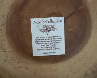 F21- $15. Acacia Wood Bowl. Measures 9.5" wide x 9" deep x 4" tall.