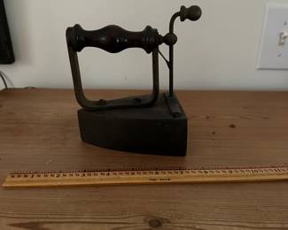 F29- $35. Cast Iron Slug/Box Iron. Measures 5.5" wide x 3.75" deep x 6.25" tall
