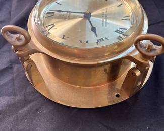 S17 - $50. Harwich Brass Quartz Mariner Ships Clock. Measures 9.25" Diameter