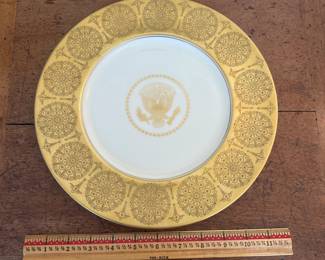 D60 - $1800. Dwight D. Eisenhower White House Plate 1955. Presidential Seal in the center with raised coin gold medallions. Back Stamp reads "Castleton Studios The White House November 1955. Measures 11.5" across. Only 120 produced!
