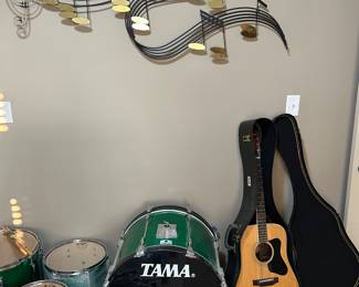 Madeira guitar, Tama emerald green drums (incomplete)
MCM C Jere’ signed 1989 wall art