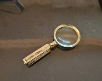 Vintage folding magnifying glass