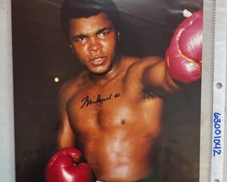 Photo Autographed by Muhammad Ali (STAT COA included)