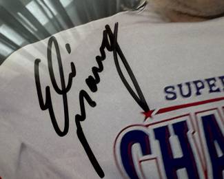 Framed Daily News Cover "Champs" Autographed by Eli Manning (NO COA)