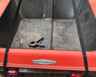 Harley-Davidson Golf Cart Utility Bed – Vintage Red Model with Rear Cargo Box
Classic Harley-Davidson golf cart with a rear utility bed, perfect for hauling gear, tools, or supplies. Features durable molded cargo box, working tail lights, and signature Harley-Davidson emblem. Great for collectors, restoration projects, or functional use on property, farm, or event spaces.