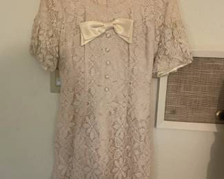 Ivory Vintage dress. No visible stains. needs to be 'refreshed'. Looks to be a size Small.