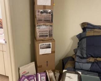Two boxes w/ 2 wine racks in each...New. Stackable. Uncounter light fixtures