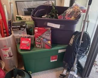 Holiday decoration storage, lights, cords, tree stands, vacuum cleaner