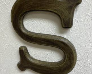 "S"
