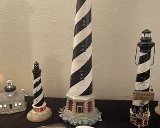 Closer look - Tall lighthouse has 'broken rock pieces' on base (lower left). All pieces appear to be there - see next pic.