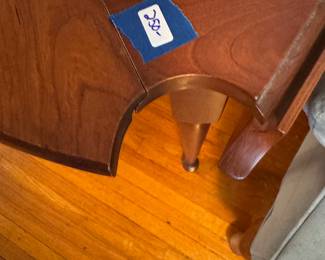 Triangular, drop leaf, with rounded notches…. Please explain this to me this weekend…