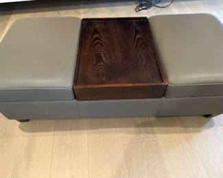 Grey storage ottoman (closed)