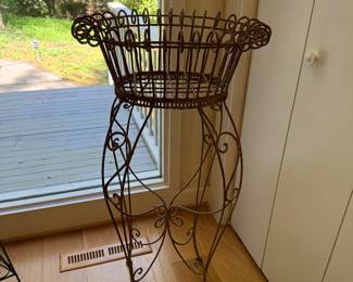 Vintage Wrought Iron plant Stand - $100 
42 inches tall 