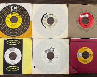 Vintage promotional 45s typically sent to radio stations (with sleeves)