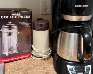 Coffee press, grinder and drip coffee maker