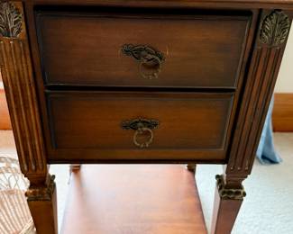 Vintage end table with brass accents