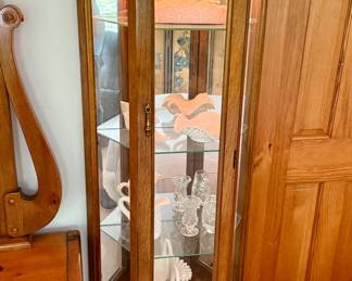 Tall curio cabinet