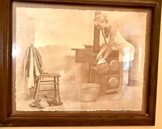 Framed print titled "LadyPouring Bath Water" by R. Hendrickson