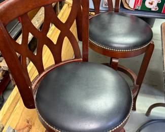 High-back swivel bar stools with leather seats