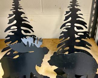 Metal moose and bear pillar candle holders