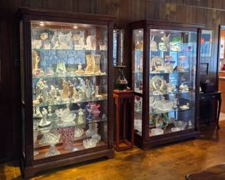 Contents of display cases have been dispersed throughout the home for presentation.
