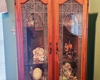 Beautiful cabinet filled with more collectibles.