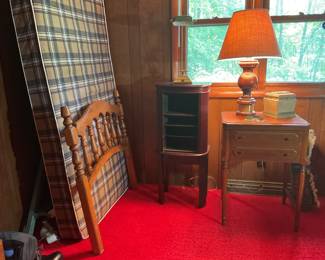 Twin bed with headboard and simple metal frame